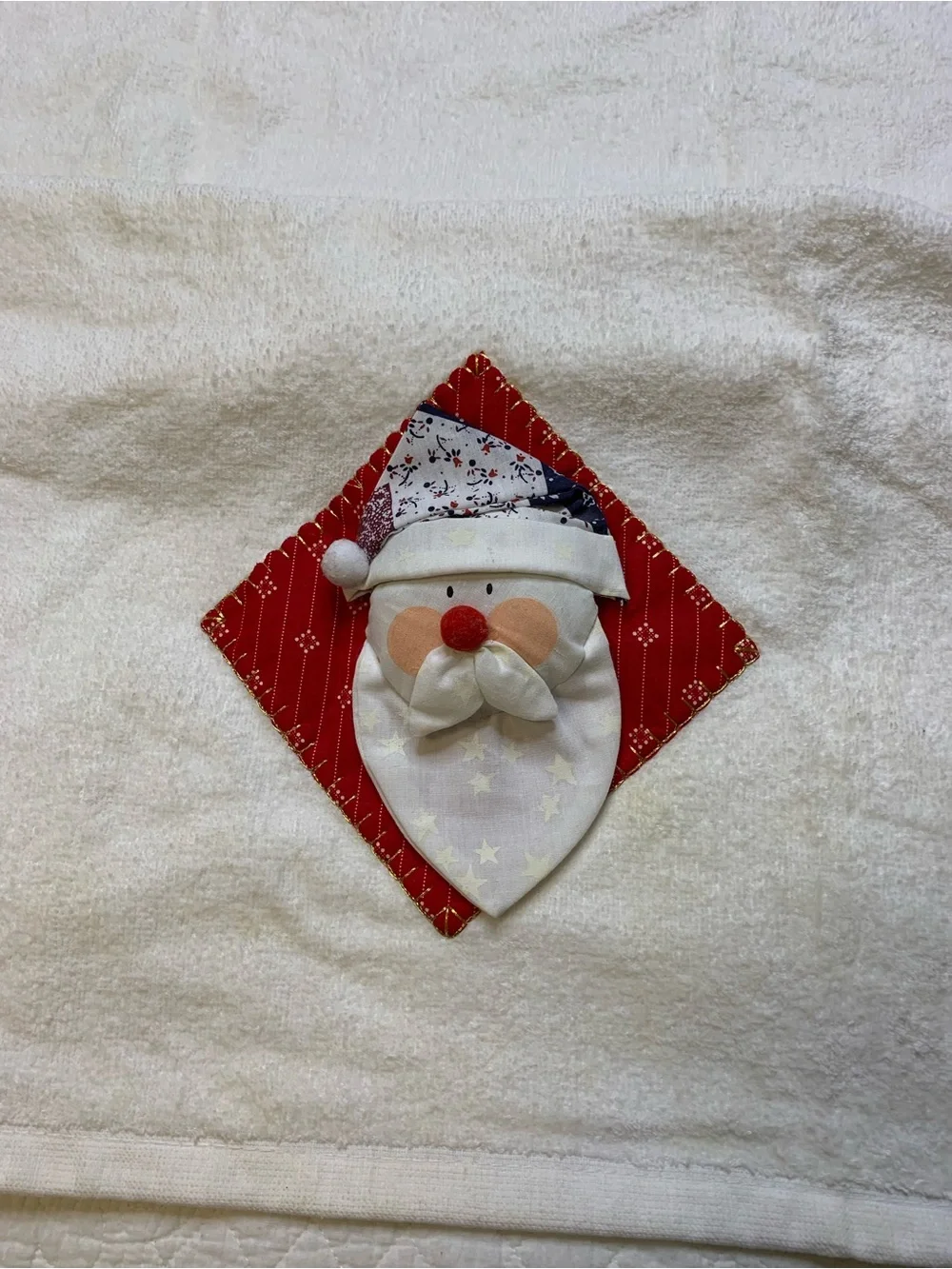 Holiday Artisan Quilted Santa Face Hand Towel Accent - Red and White